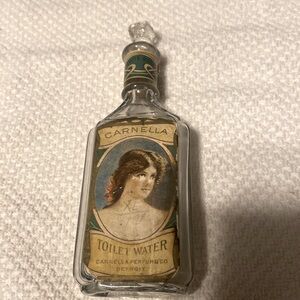 1914 Carmella Toilet water bottle with revenue stamp. RARE